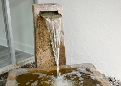 A fountain in the courtyard at Pasadena Villa